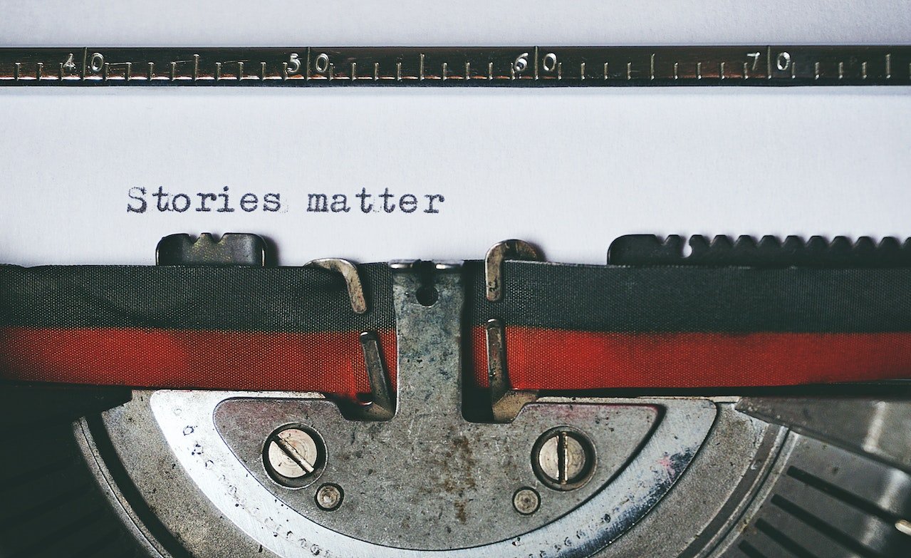 Typewriter with the text Stories Matter